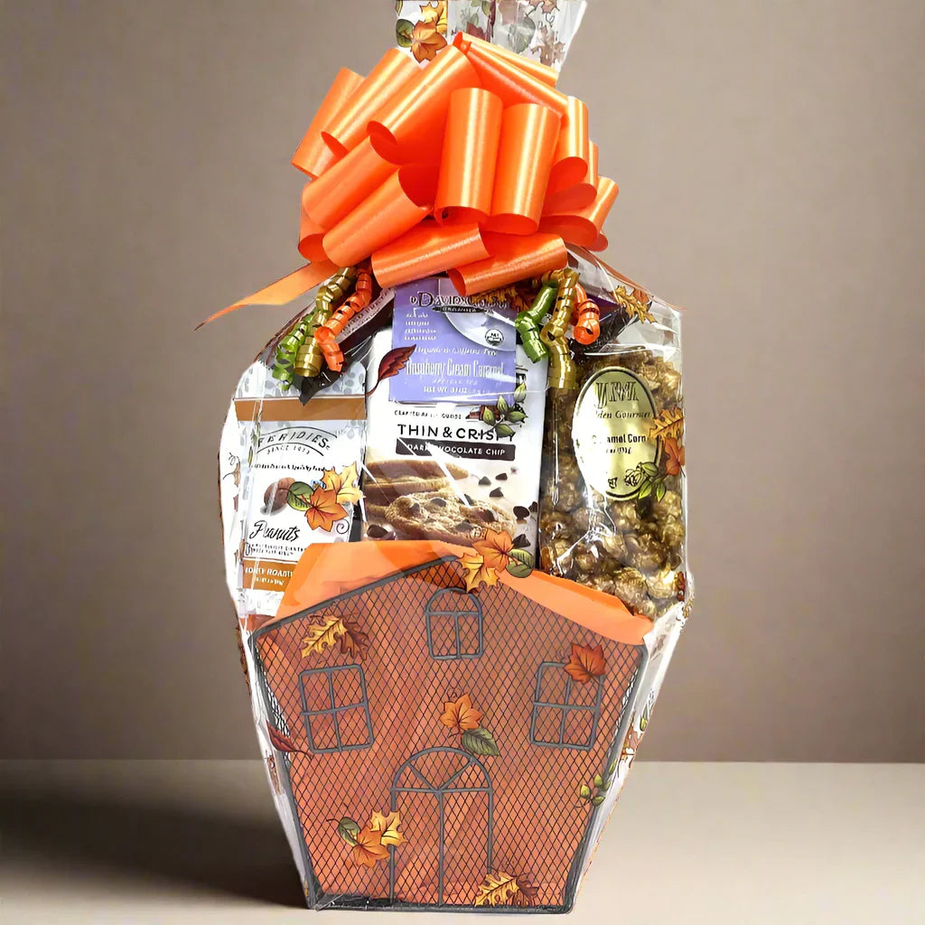 Housewarming gift basket with cookies, caramel popcorn and chocolate covered pretzels